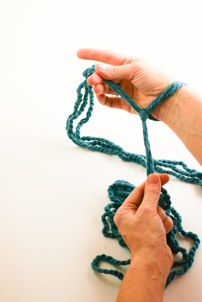 Knitting with arms online as needles