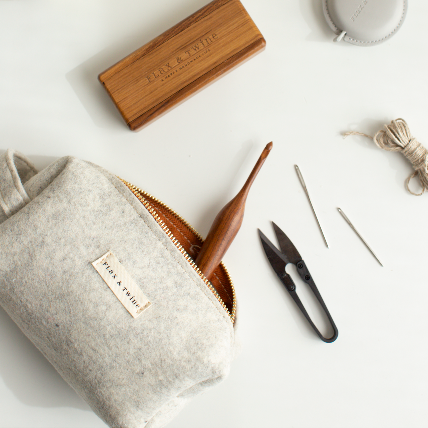 Flax & Twine Felt Notions Bag and Box with crochet hook, scissors, and needles
